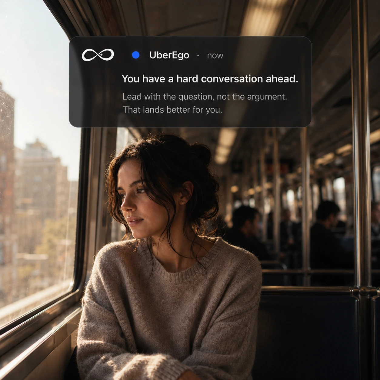 A woman on a train receiving a UberEgo notification predicting a hard conversation ahead and how to approach it